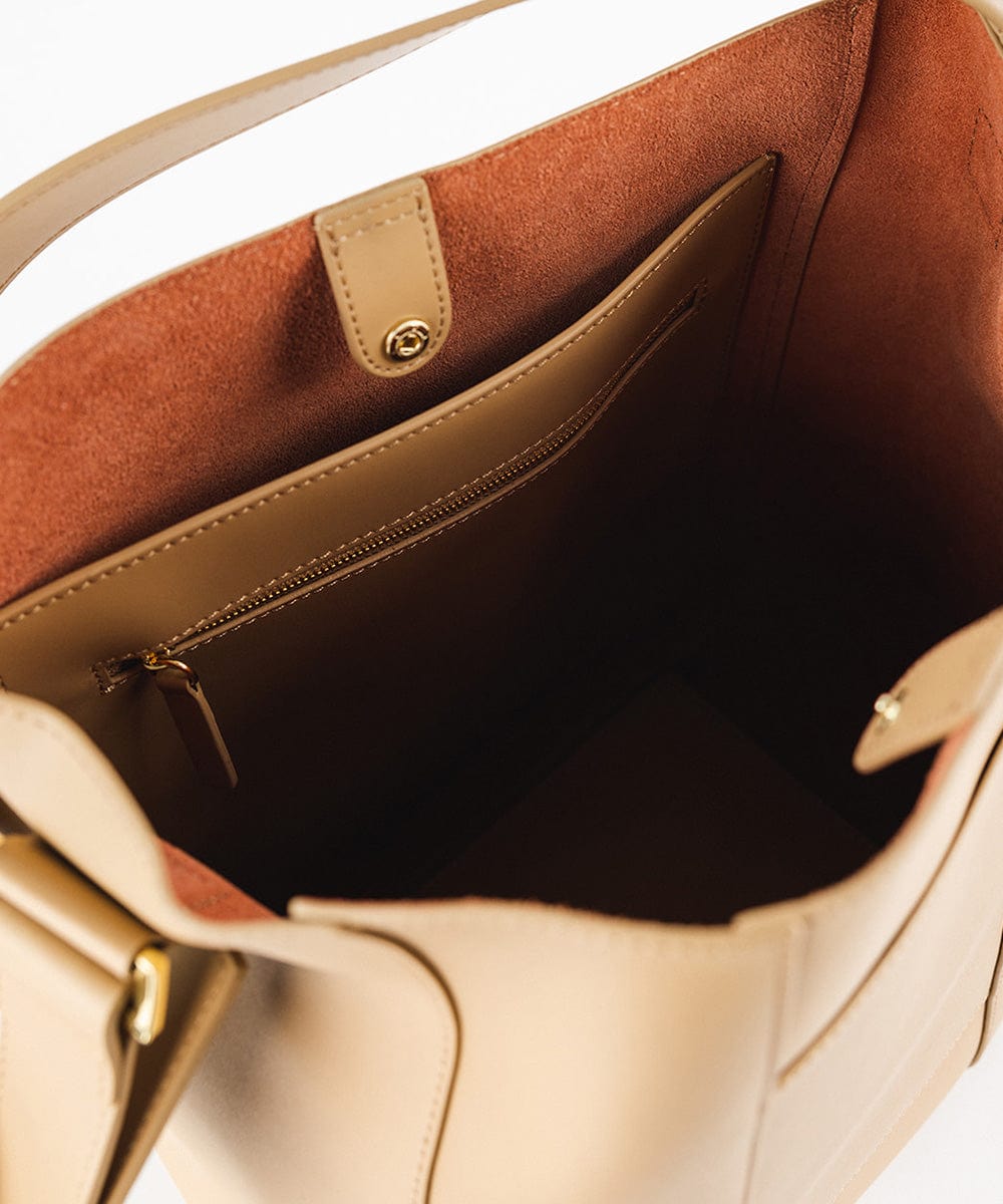 The interior of a tan Dia Everyday Leather Tote Bag #color_tan