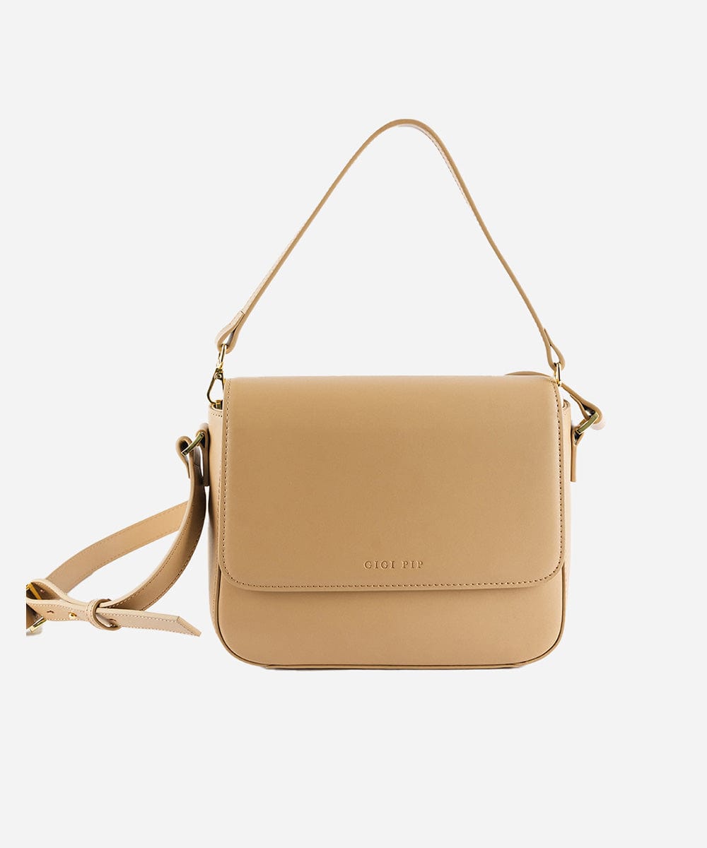 A tan Rhys Crossbody Genuine Leather Bag with a detachable strap, displayed against a plain background. #color_tan