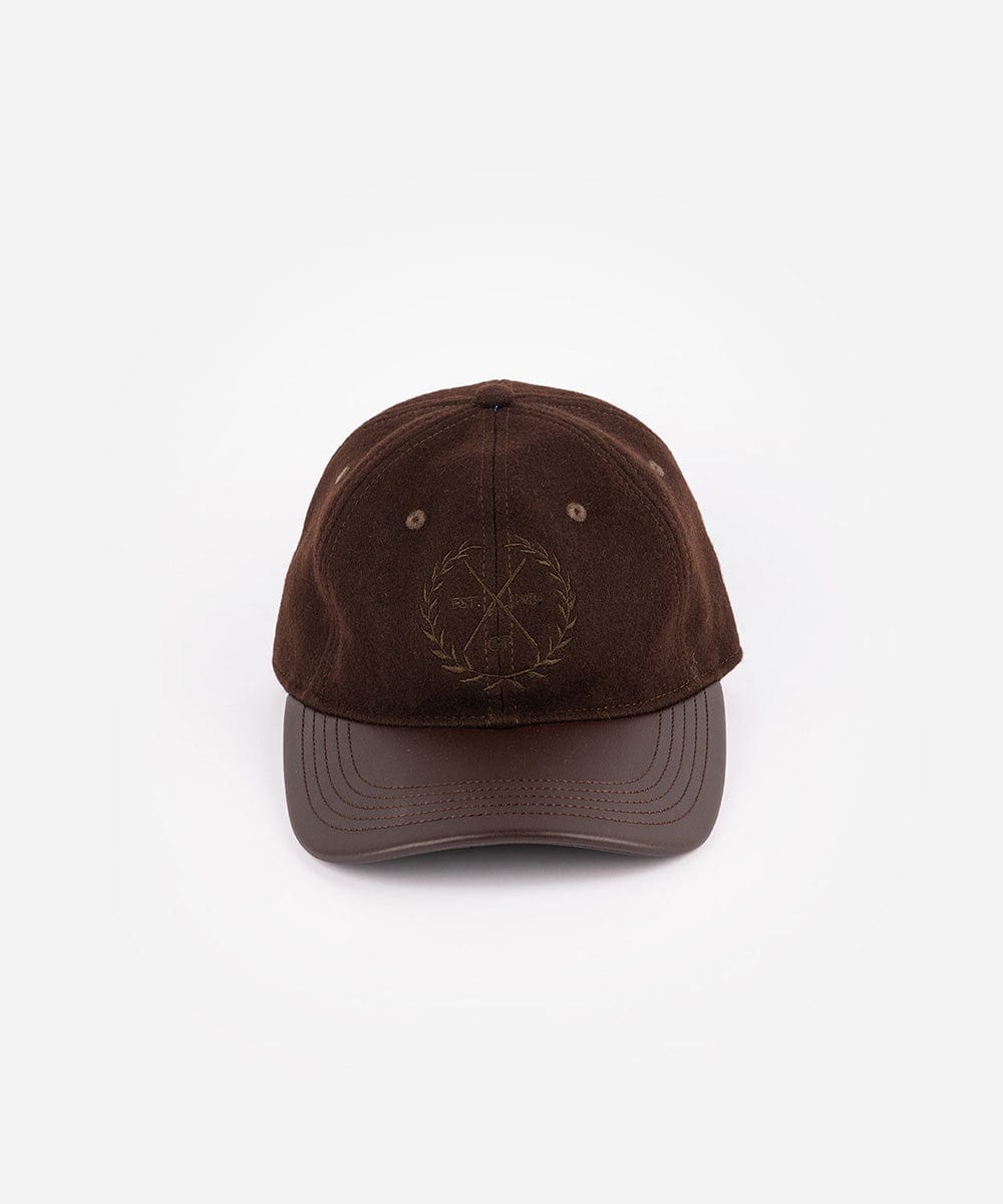A brown cap with a logo on a white background #color_brown