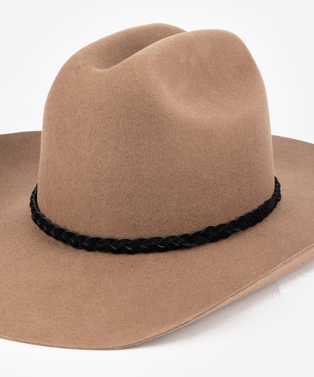 Brown cowboy hat with a black braided band on a white background #color_black