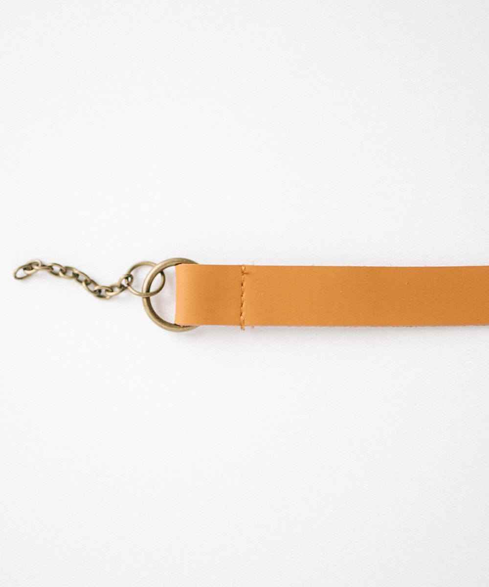 A cognac colored leather adjustable chain band on a white background #color_cognac
