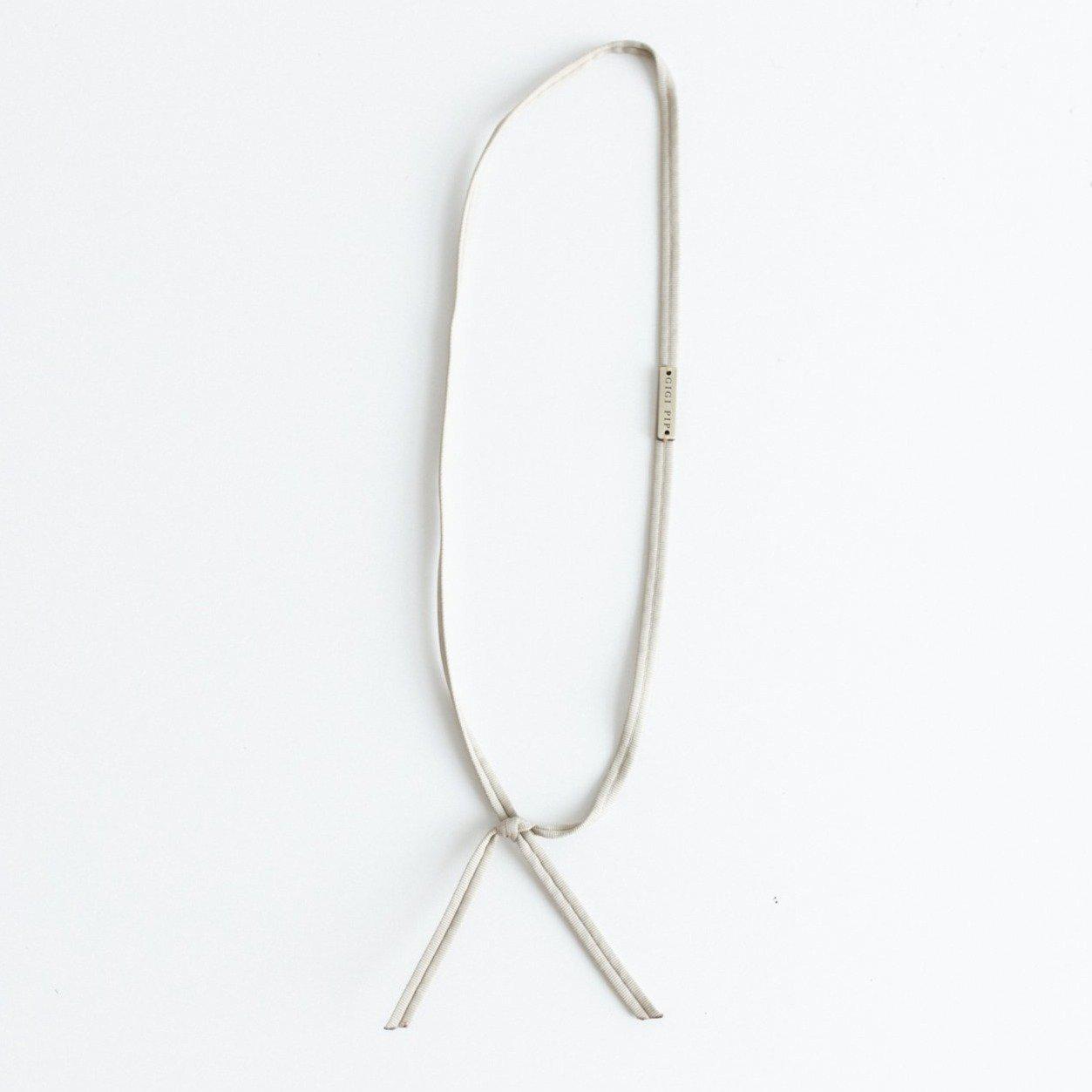 A sage grosgrain band on a plain background #color_sage