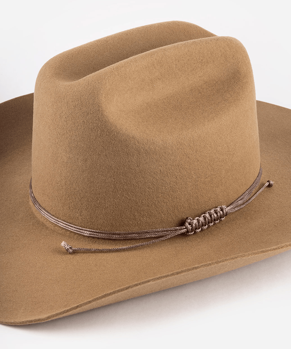 Brown cowboy hat with a string triple wrap band on a white background #color_dark brown
