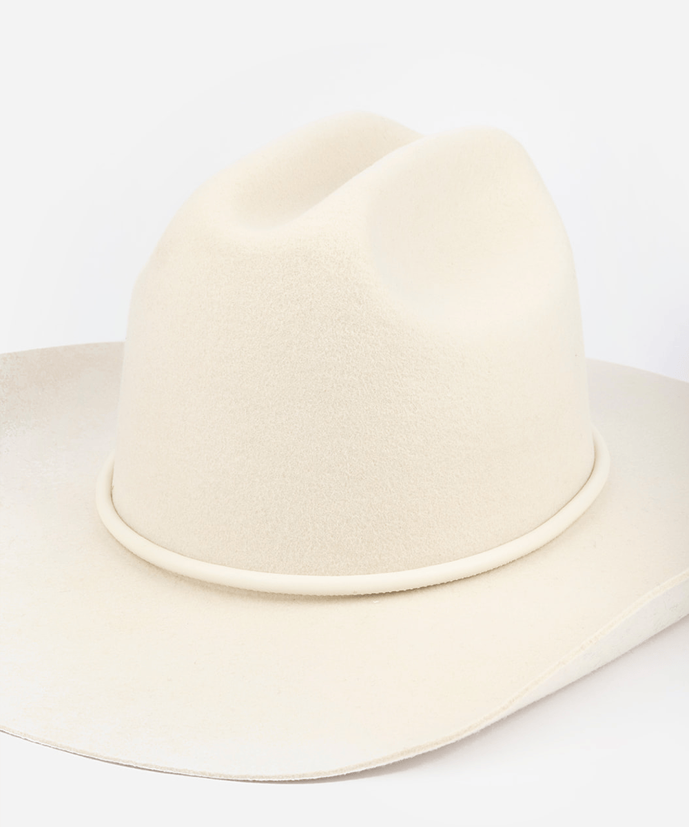 White wide-brimmed hat on a white background #color_off white