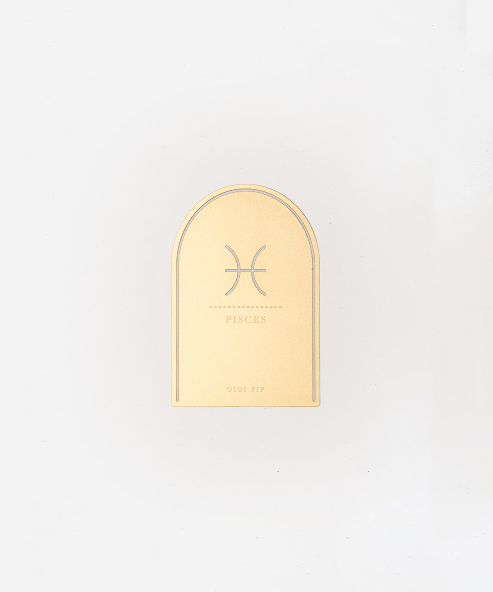 Gold 'Pisces' zodiac sign plaque on a light gray background #color_gold