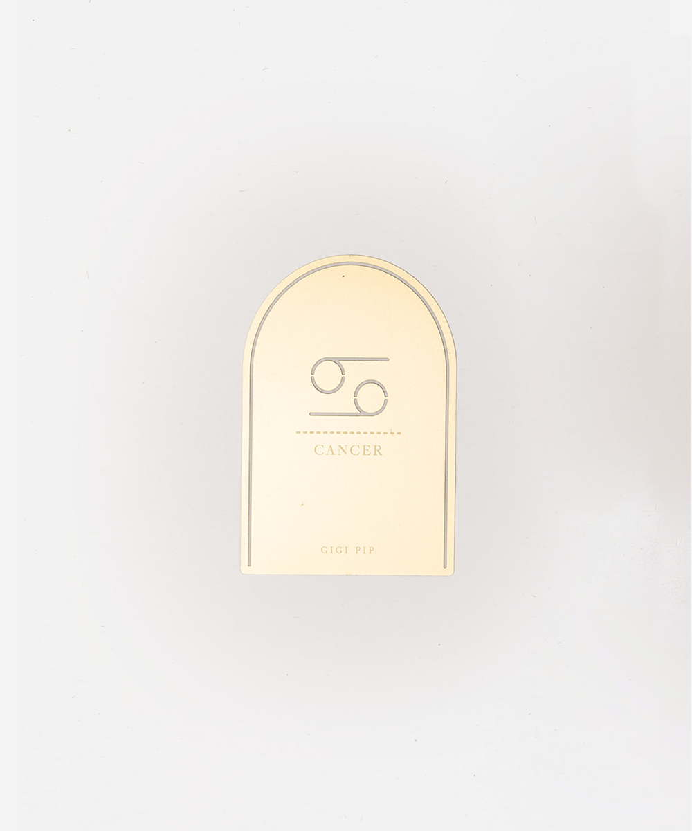 Gold 'Cancer' zodiac sign plaque on a light gray background #color_gold