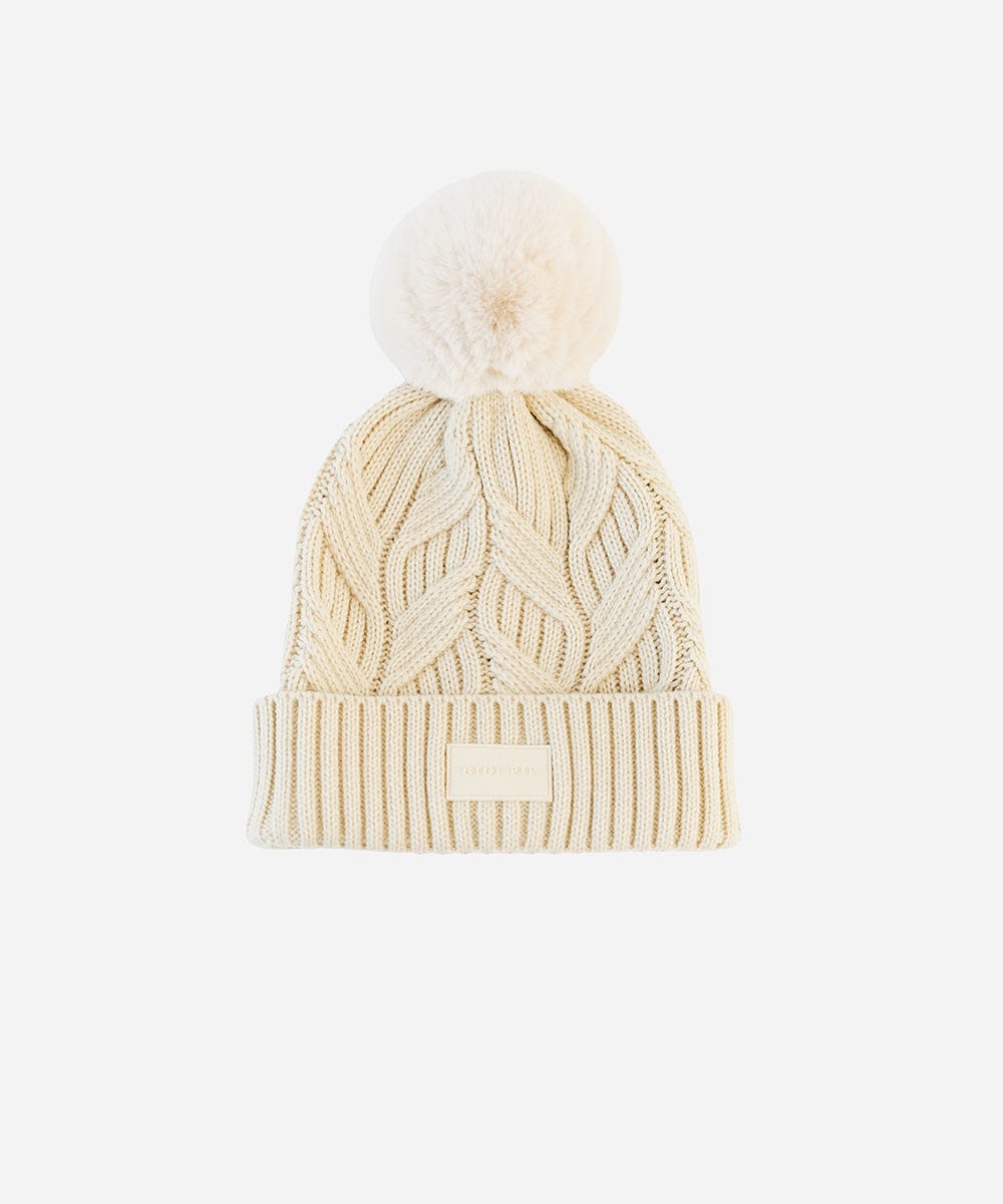 A cream knit beanie with a pom-pom on a plain background #color_cream