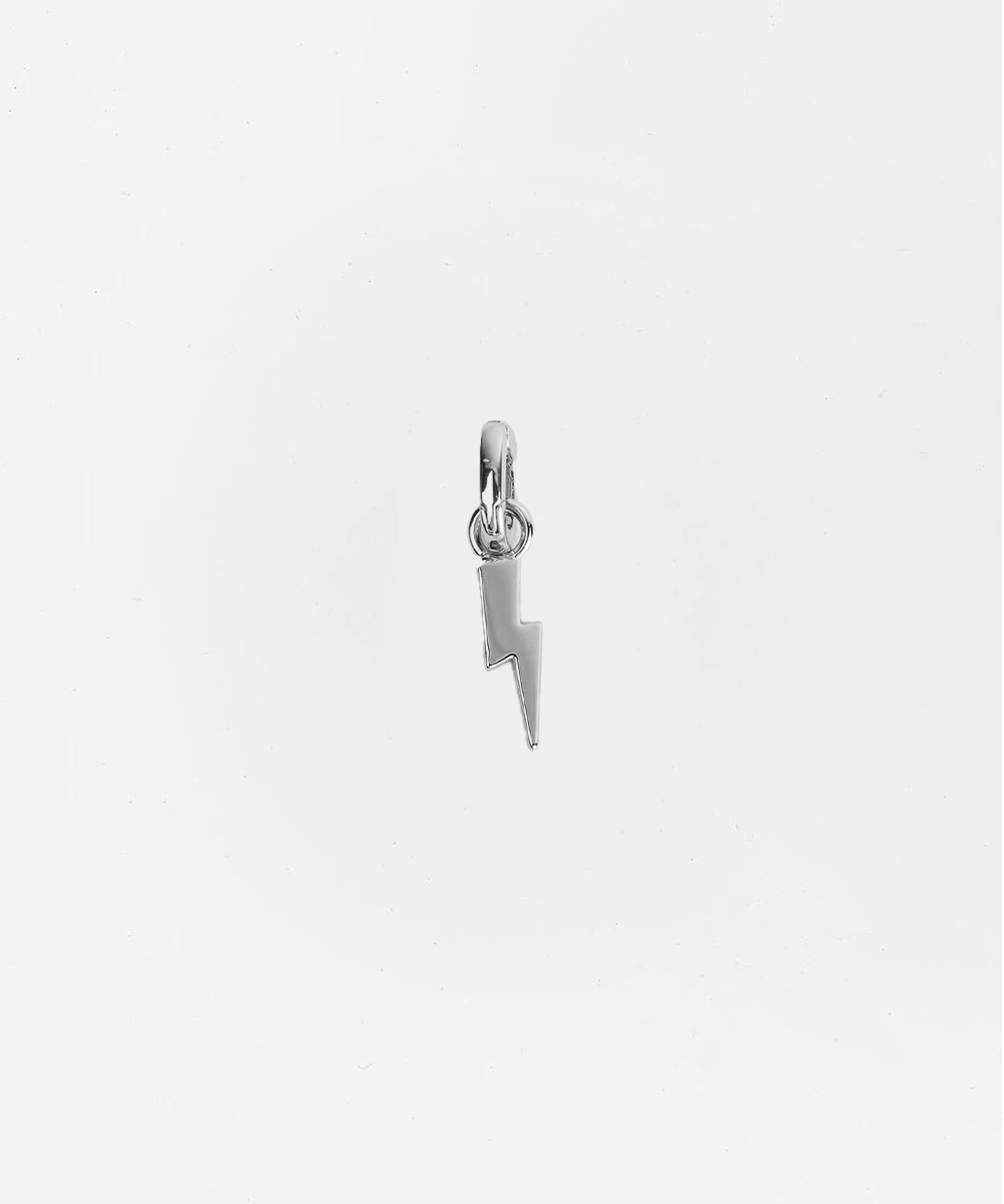 Silver lightning bolt hat charm on a white background #color_silver