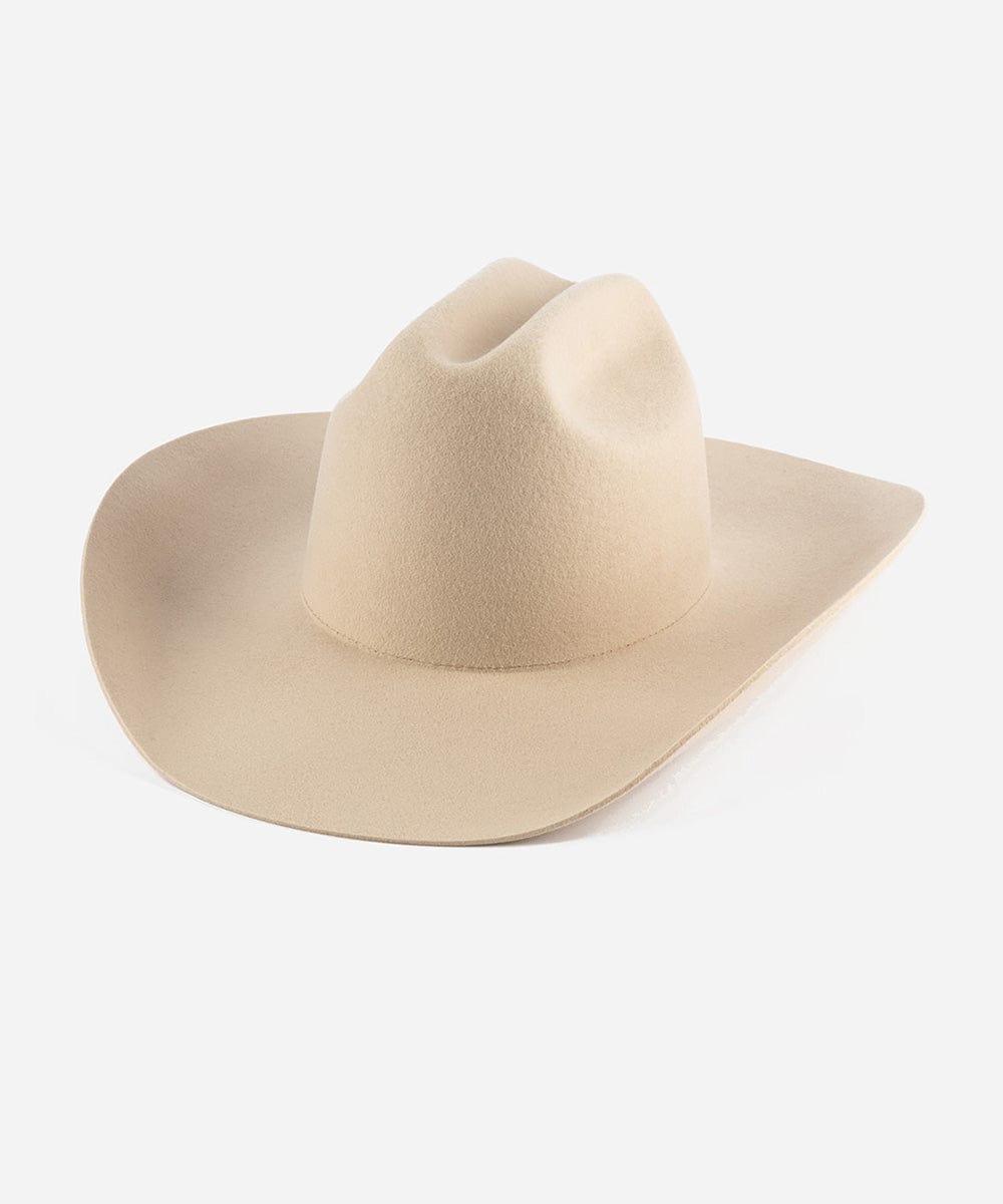 A cream cowboy hat with a wide brim and a true western cattleman crown. #color_cream