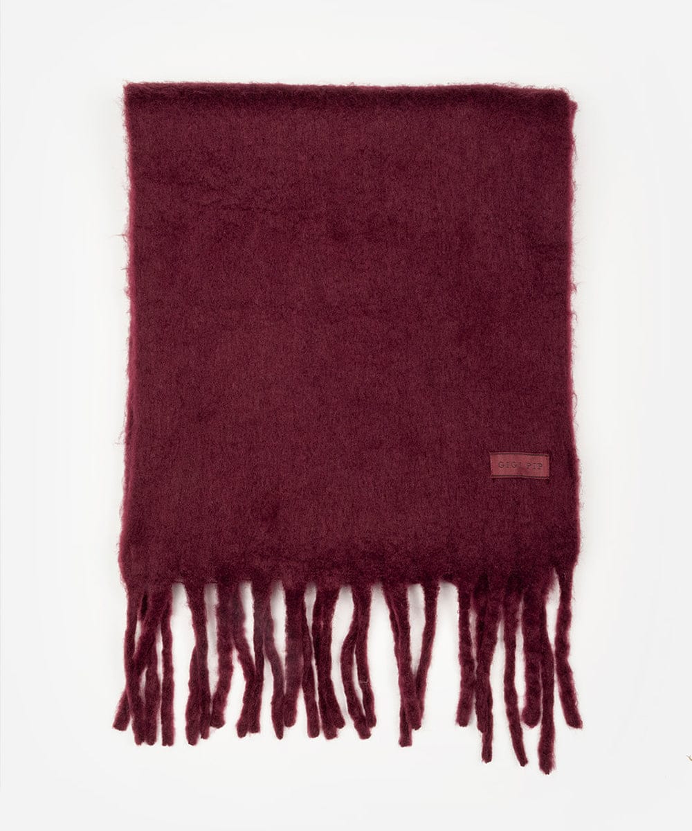 Burgundy scarf with fringes on a white background #color_merlot