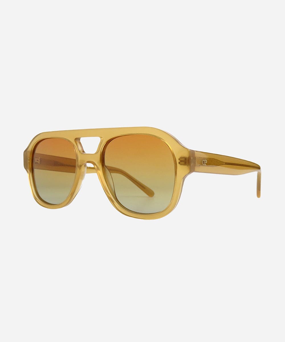 A pair of honey colored retro aviator sunglasses with an oversized frame and gradient tinted lenses, from tip to tip on a plain background. #color_honey