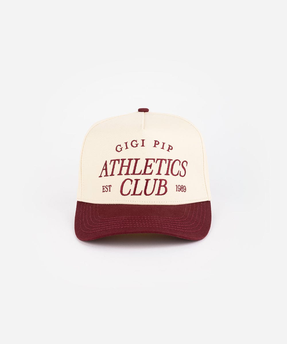 Burgundy Trucker hat with 'Gigi Pip Athletics Club' text on a white background #color_burgundy