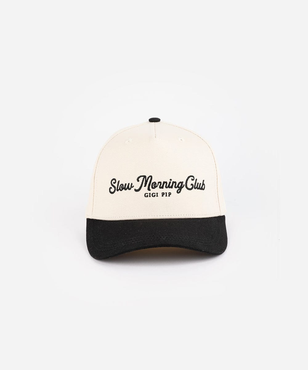 A cream and black cap with the text "Slow Morning Club", on a plain background #color_cream - black