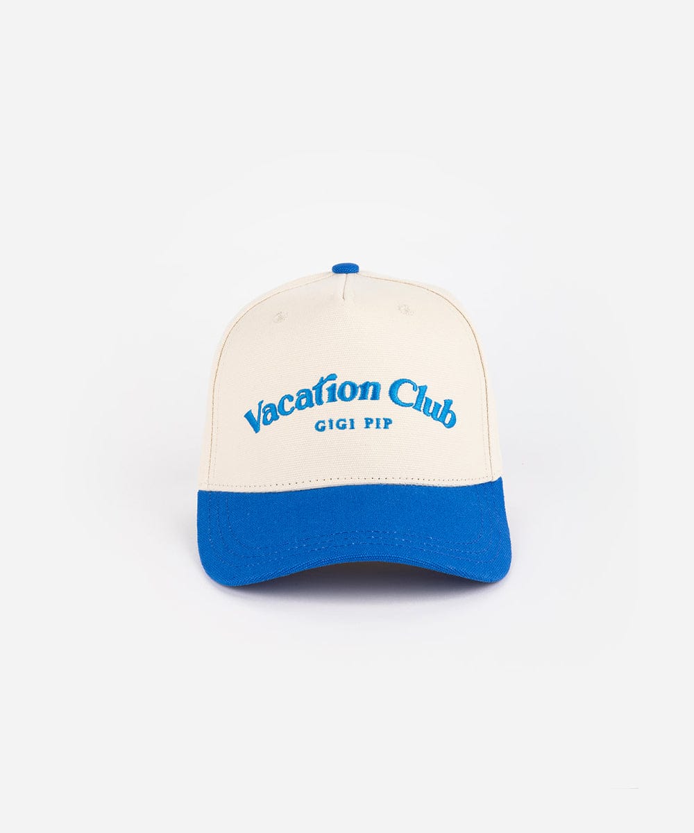 A cream and blue cap with 'Vacation Club' text on a white background #color_cream - blue