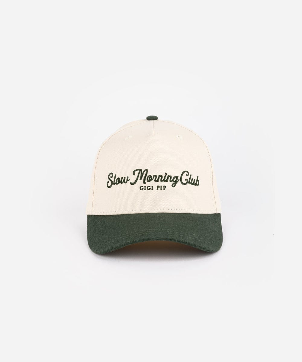 A cream and dark green cap with 'Slow Morning Club' text on a white background #color_cream - dark green
