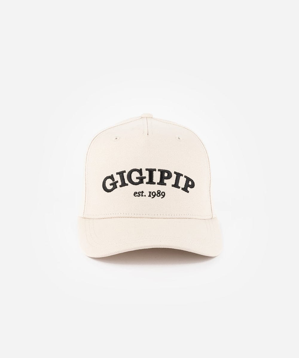Beige cap with 'GIGIPIP est. 1989' text on a white background #color_cream