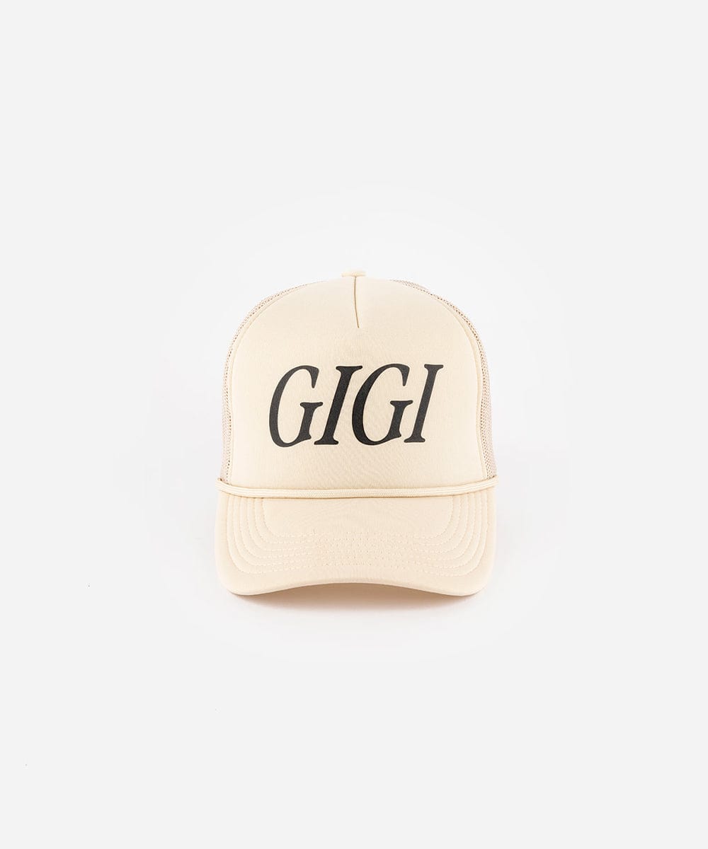 A cream cap with 'GIGI' text on a white background #color_cream