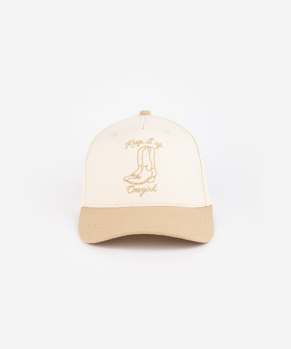 A cream and tan cap with tan text and boot design on a white background #color_cream - tan