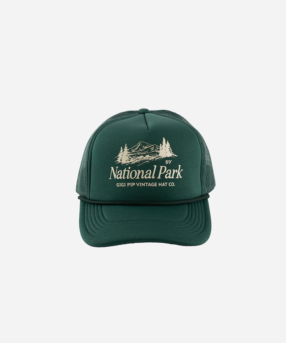 A forest green colored trucker hat with 'National Park' logo on a white background #color_forest green