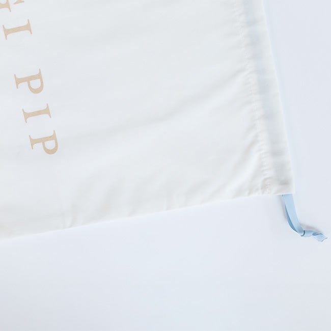 A white bridal keepsake duster bag on a plain background #color_white