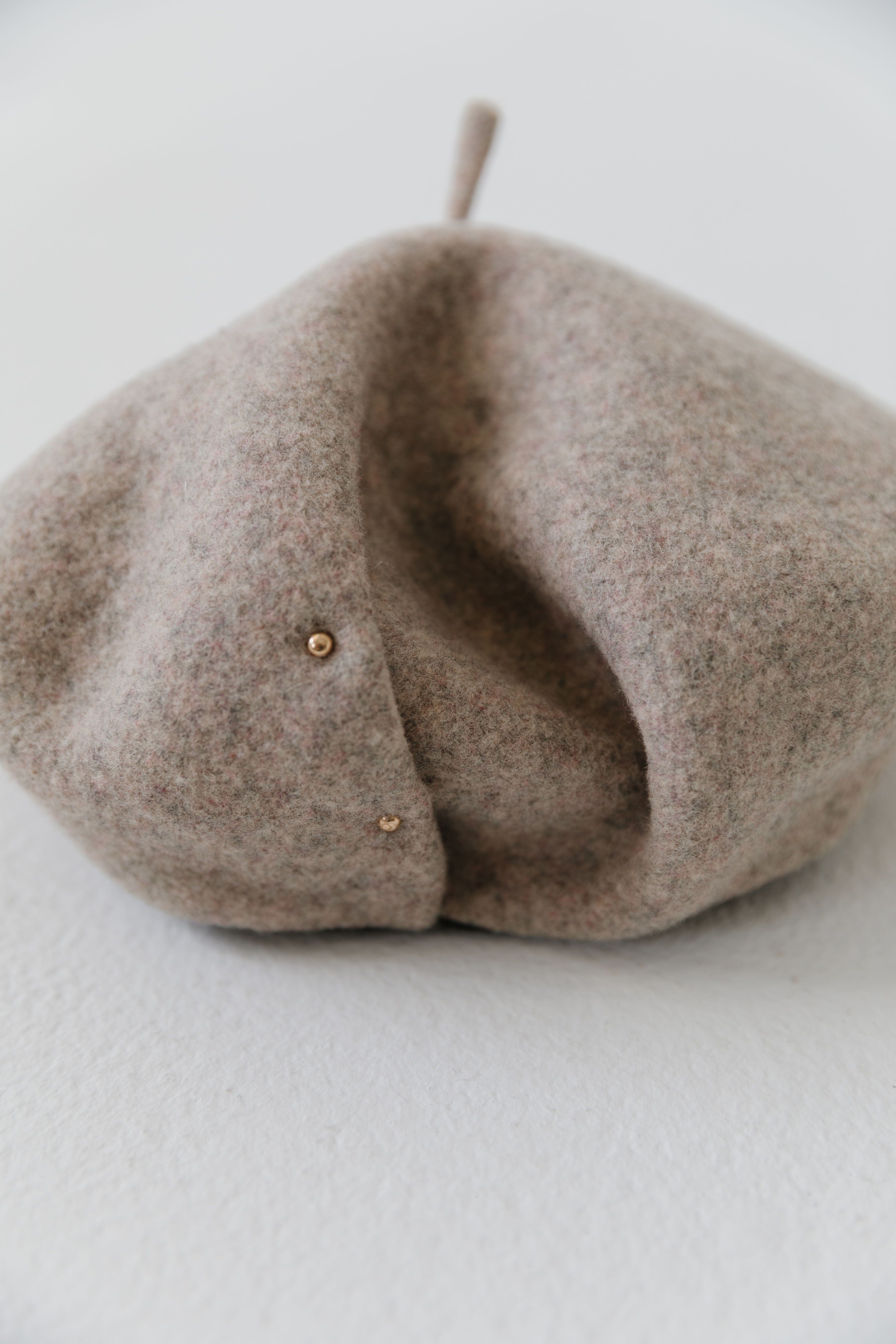A taupe beret on a white background #color_taupe