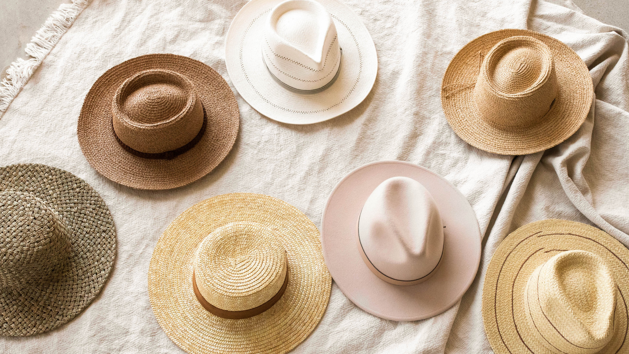 flat lay of multiple hats