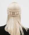 Gigi Pip winter hats for women - Ashton Retro Headband - 10% wool + 90% acrylic classic retro ski style headbands with limited edition holiday logo [taupe]