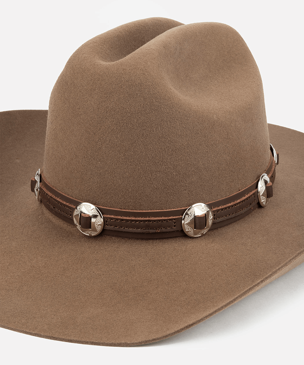 Brown cowboy hat with decorative concho band on a white background #color_chocolate