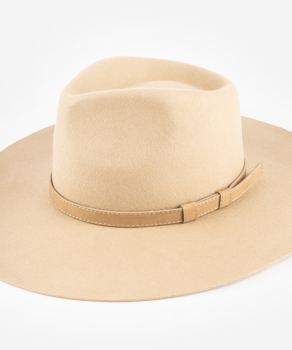 Beige fedora wide-brimmed hat with a leather band on a white background #color_tan