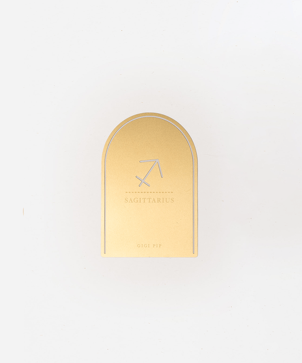 Gold 'Sagittarius' zodiac sign plaque on a light gray background #color_gold