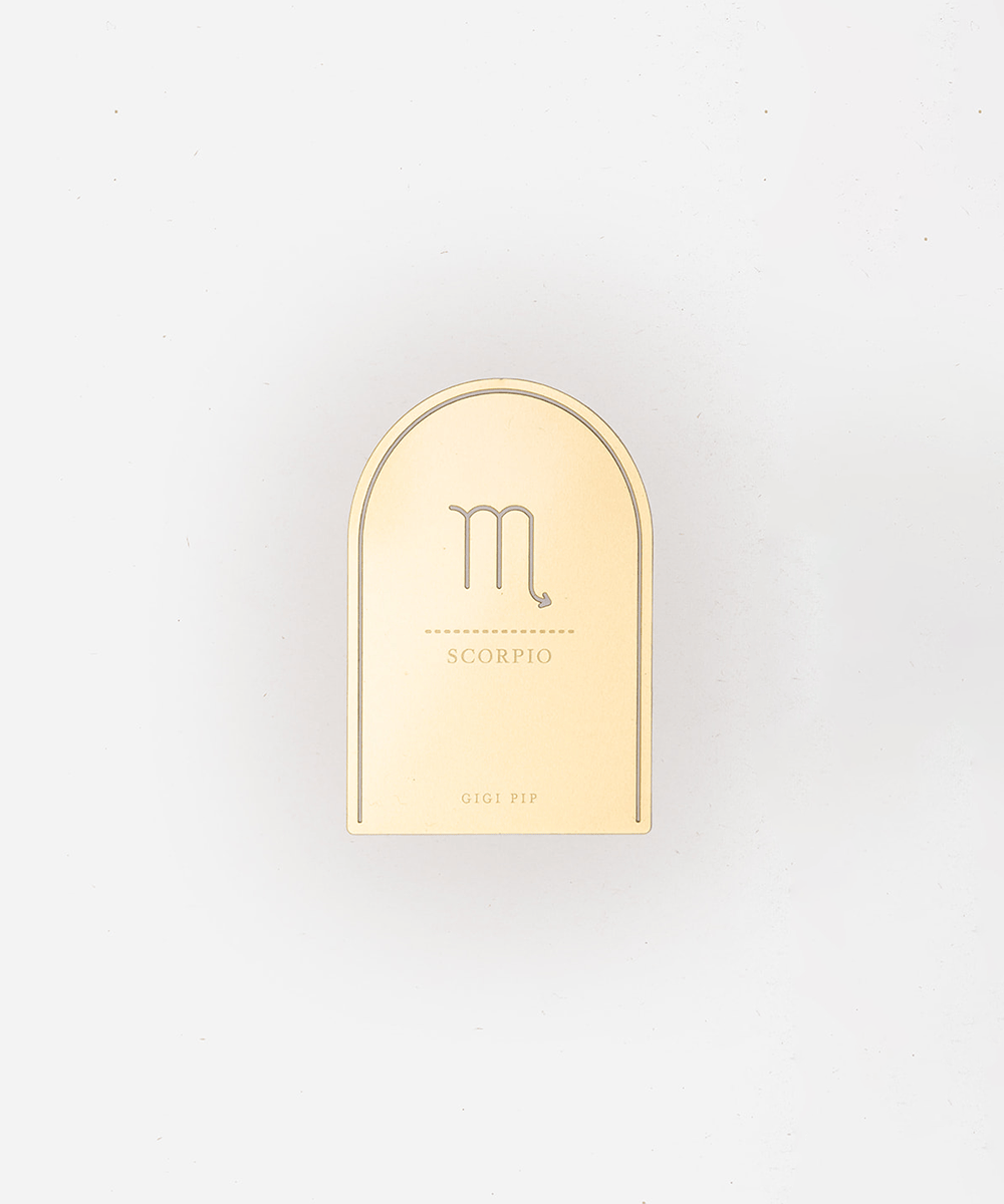 Gold 'Scorpio' zodiac sign plaque on a light gray background #color_gold