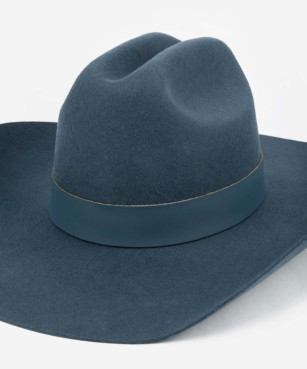 Blue cowboy hat on a white background #color_vintage blue