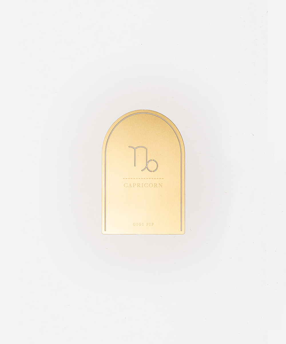 Gold 'Capricorn' zodiac sign plaque on a light gray background #color_gold