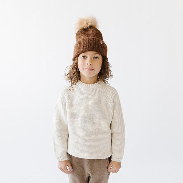 Gigi Pip beanies for kids - Milo Beanie - soft knit ribbers kid's beanie featuring a fold up brim with a rose gold Gigi Pip logo pin on the side of the fold and a pom pom on the center of the crown [chocolate brown]