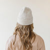 Gigi Pip beanies for women - Collins Beanie - soft knit ribbed women's beanie featuring a fold up brim with a rose gold Gigi Pip logo pin on the side of the fold [oatmeal]
