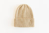 Gigi Pip beanies for women - Ky Thick Knit Beanie - 100% acrylic thick knit beanie with a statement fold featuring the rose gold Gigi Pip pin on the forehead [tan]