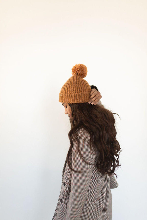 Gigi Pip beanies for women - Mo Pom Beanie - classic knit beanie with a pom on the crown, featuring the Gigi Pip logo on a metal bar on the front fold [cinnamon]