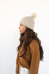 Gigi Pip beanies for women - Mo Pom Beanie - classic knit beanie with a pom on the crown, featuring the Gigi Pip logo on a metal bar on the front fold [cream]
