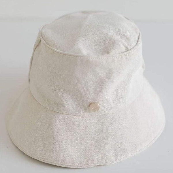 Gigi Pip bucket hats for women - Rylee Bucket Hat - 100% cotton bucket hat with a silk inner liner and an adjustable sweatband, featuring a gold Gigi Pip pin on the back of the crown [cream]