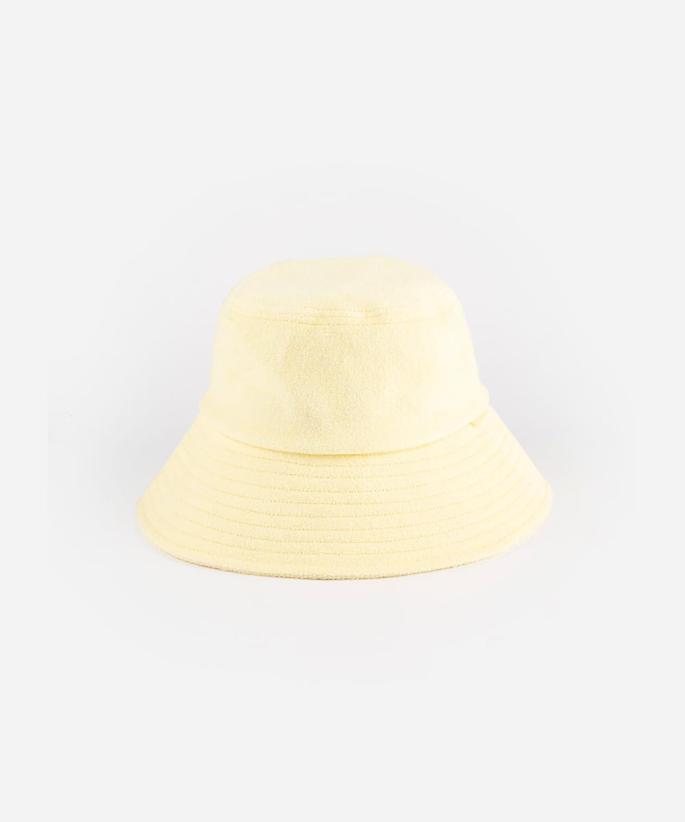 Yellow bucket hat on a light gray background #color_butter yellow