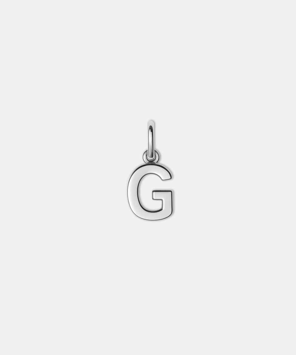 Silver letter 'G' hat charm on a white background #color_silver