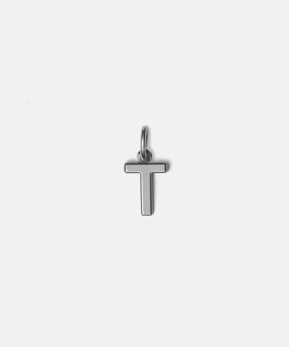 Silver letter 'T' hat charm on a white background #color_silver