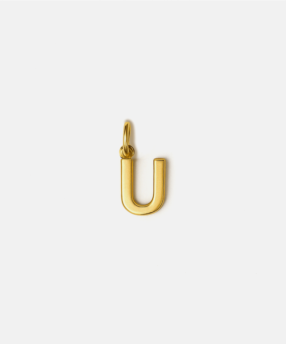 Gold letter 'U' pendant hat charm on a white background #color_gold