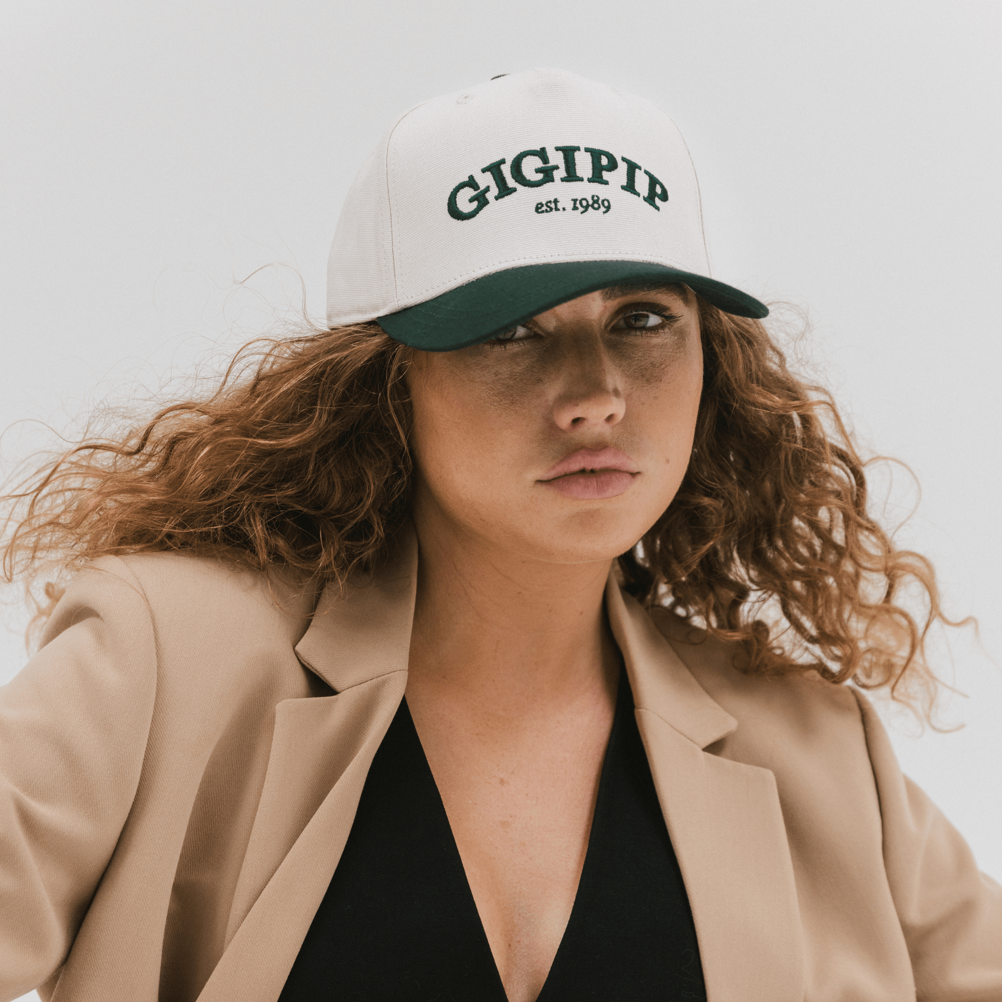 Gigi Pip trucker hats for women - Gigi Pip Canvas Trucker Hat - 100% Cotton Canvas w/ cotton sweatband + reinforced from panel with 100% polyester mesh trucker hats with gigi pip embroidered on the front panel with an adjustable velcro bag [cream]