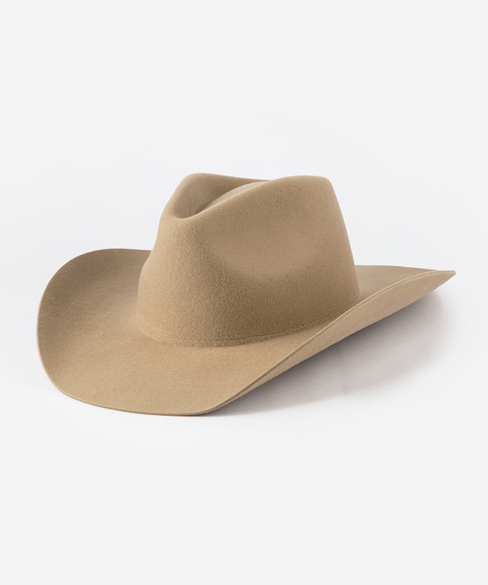 Beige cowboy hat against a white background #color_tan