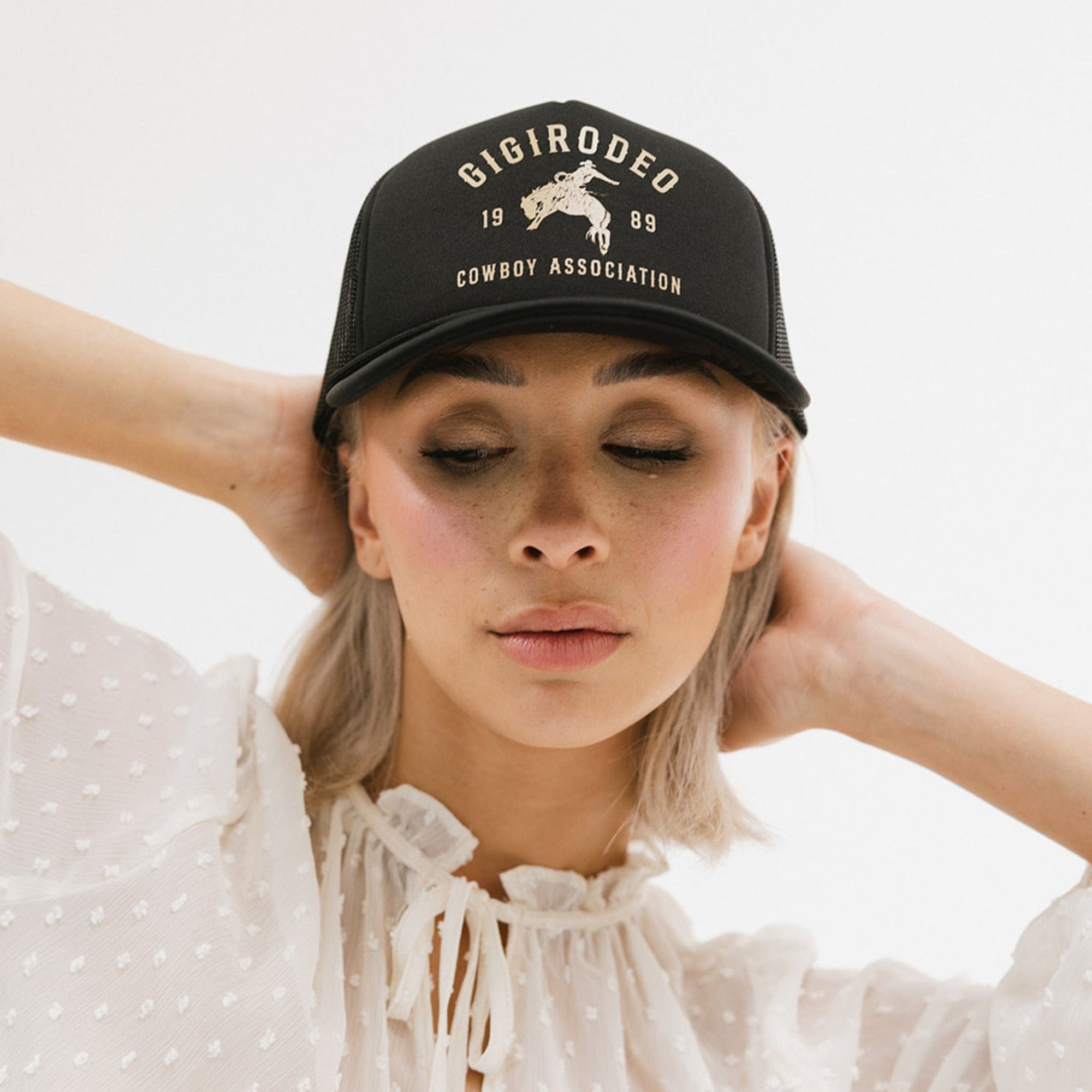 Gigi Pip trucker hats for women - Gigi Rodeo Foam Trucker Hat - 100% polyester foam + mesh trucker hat with a curved brim featuring the words 