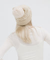 Gigi Pip beanies for women - Ida Cable Knit Beanie - 100% acrylic + faux fur pom beanie featuring Gigi Pip silicone label on foldover brim [cream]
