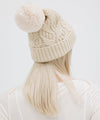 Gigi Pip beanies for women - Ida Cable Knit Beanie - 100% acrylic + faux fur pom beanie featuring Gigi Pip silicone label on foldover brim [cream]
