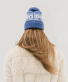 Gigi Pip beanies for women - Jane Retro Pom Beanie - retro inspired pom beanie featuring a limited edition Gigi Pip retro holiday logo [arctic blue]