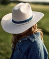 Gigi Pip limited edition hats for women - Limited Edition Hat 26 - 100% australian wool classic cattleman crown with a wide upturned brim, featuring a limited edition frayed fabric band, a white + gold bolo band + 3 turquoise beads on a coated wire string [cream]